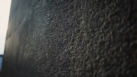 close-up of a dark, rough textured surface