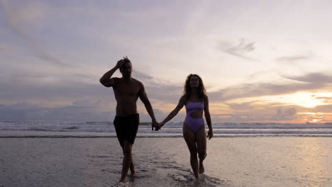 young couple in swimwear