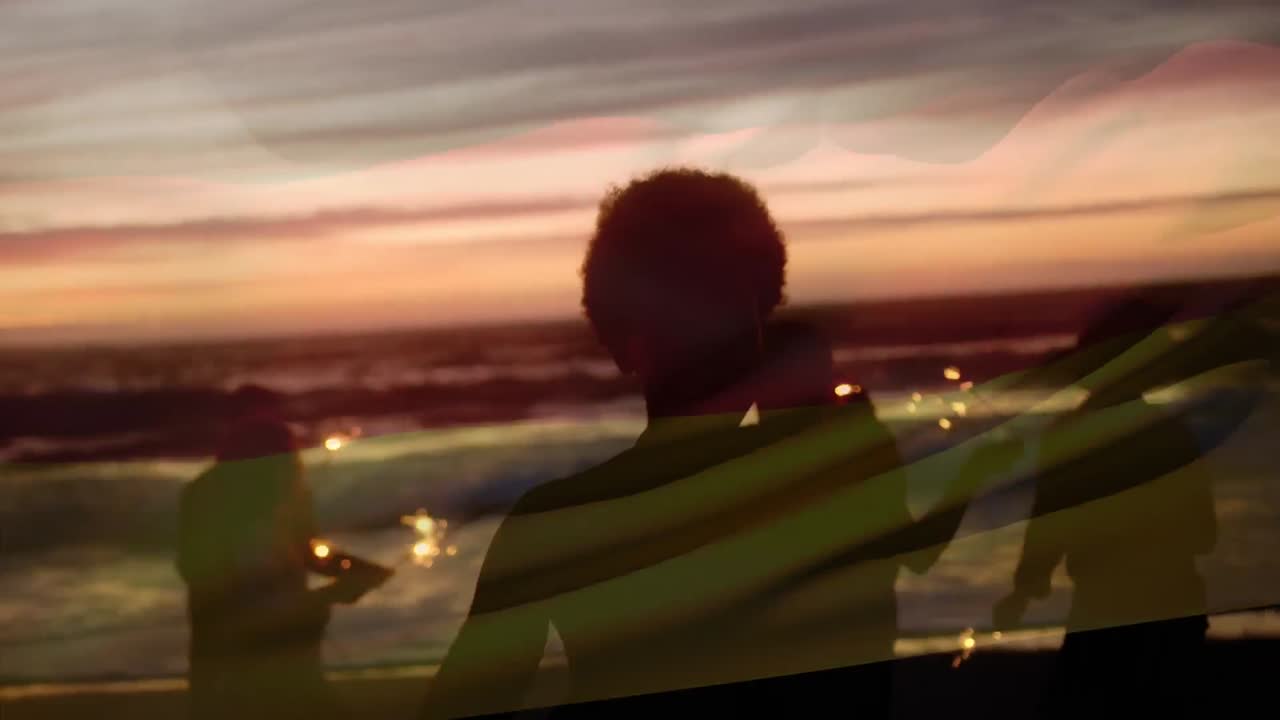 해변에 있는 다양한 친구들의 그룹 위에 독일 발을 흔들고 있는 애니메이션