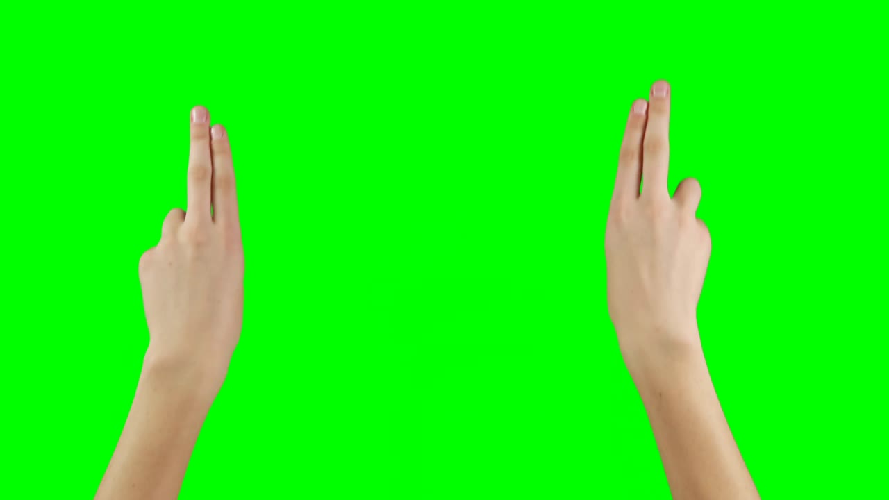 초록색 스크린 배경 에 손 의 제스처 를 하는 사람