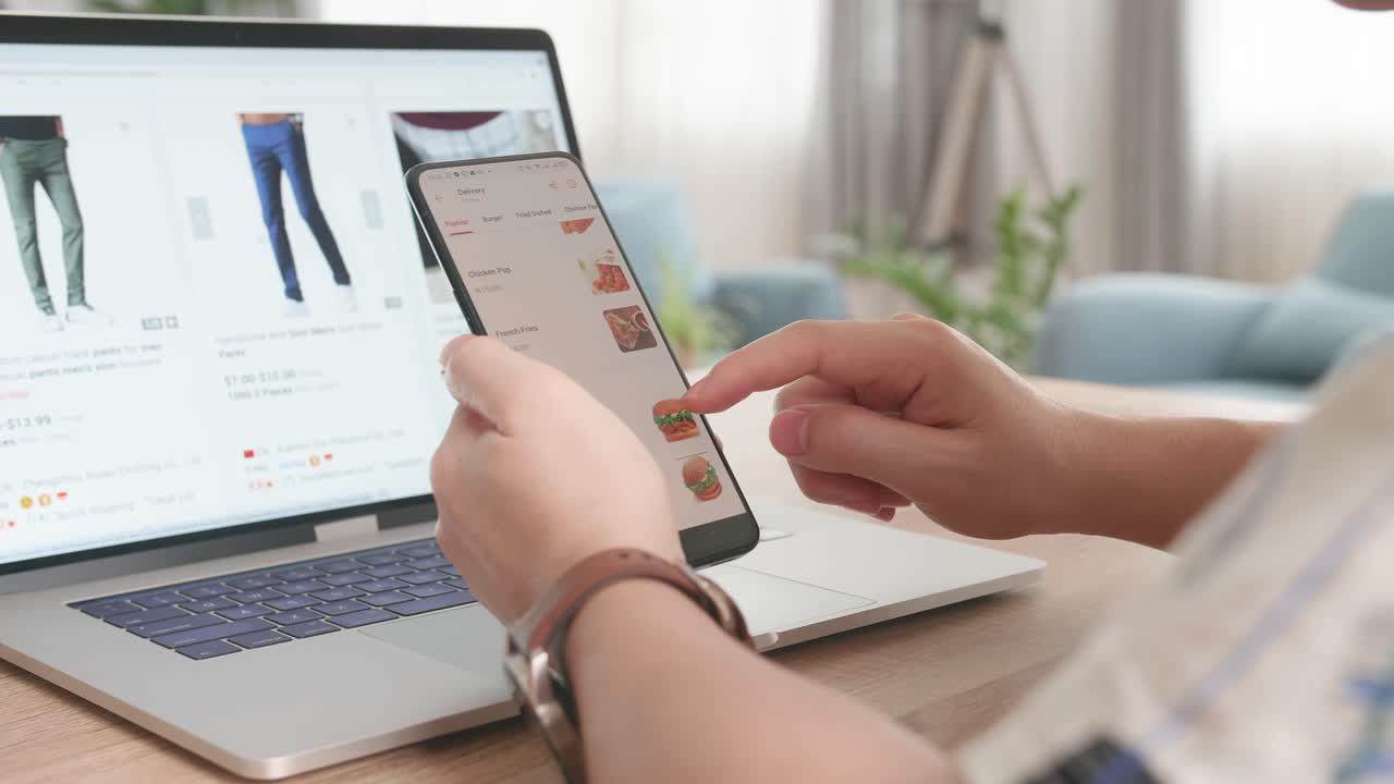 Close Up Man Using Smartphone And Laptop Computer Order Food And Clothes Online, Online Shopping