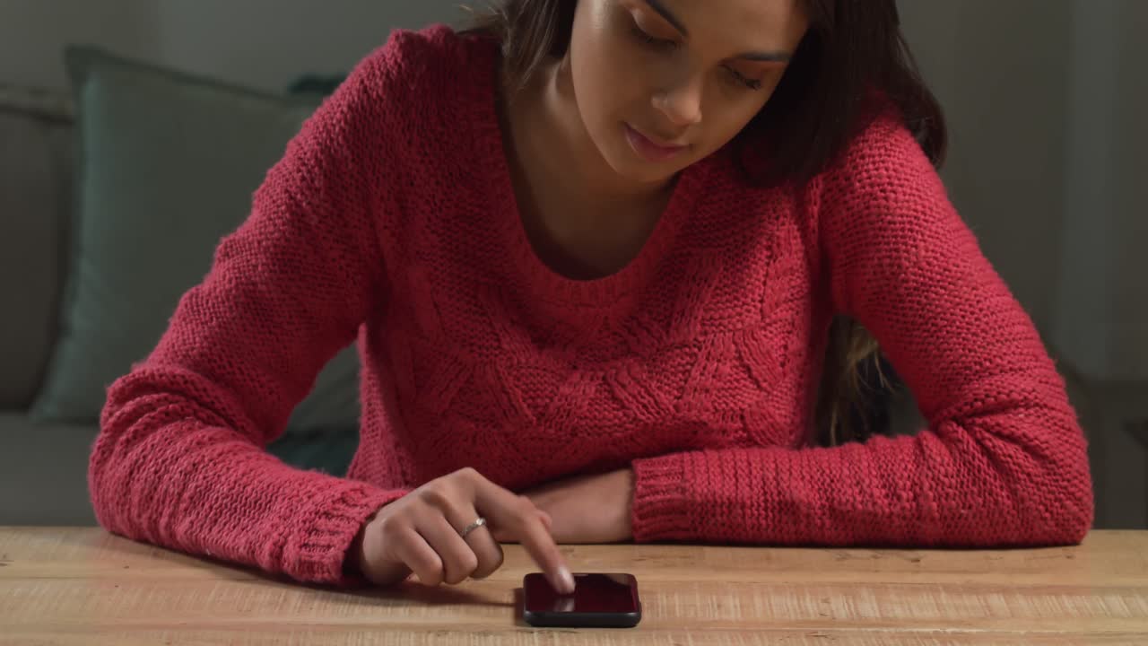 Caucasian woman using her phone