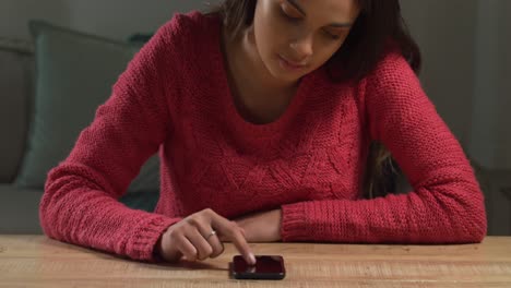 Caucasian-woman-using-her-phone-