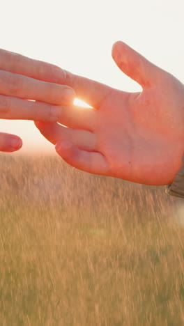 children interlock fingers under rain closeup. sister and brother bond grows stronger united by simple pleasures of companionship and exploration