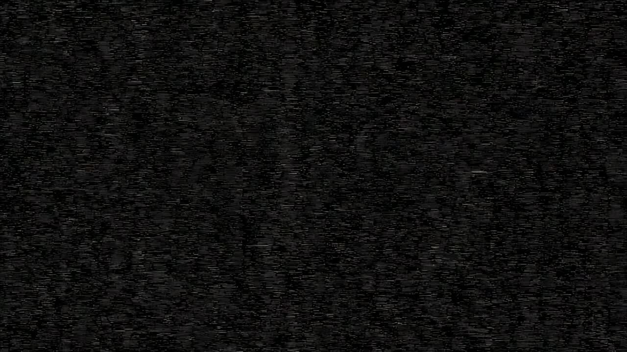 Playback starting, displaying grainy static noise persisting throughout first to last frame in dark