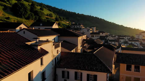 charming village in the mountains at sunrise/sunset