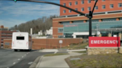 out of focus blank plate of an emergency room hospital during the day