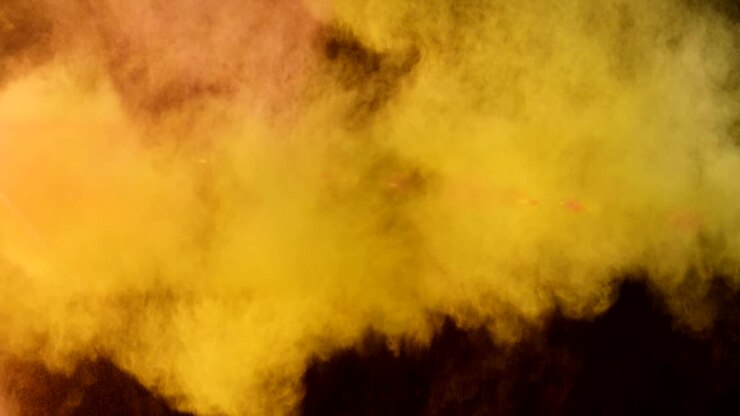 Animazione di un'esplosione di polvere e di un punto di luce brillante sullo sfondo.