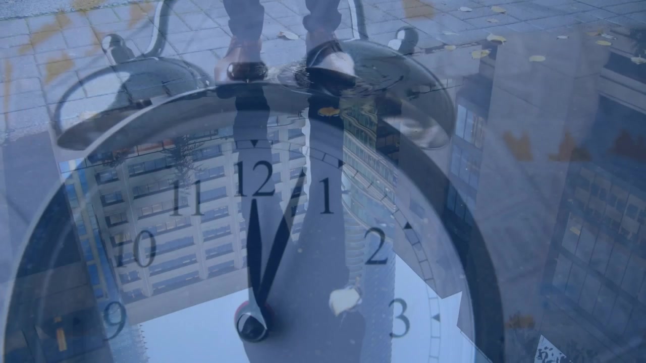 Animation of alarm clock over man walking on street