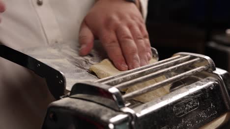 chef preparing pasta dough