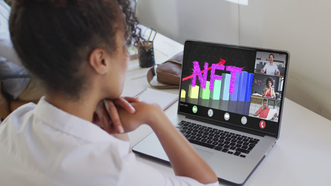 Video of biracial woman having nft video call with coworkers