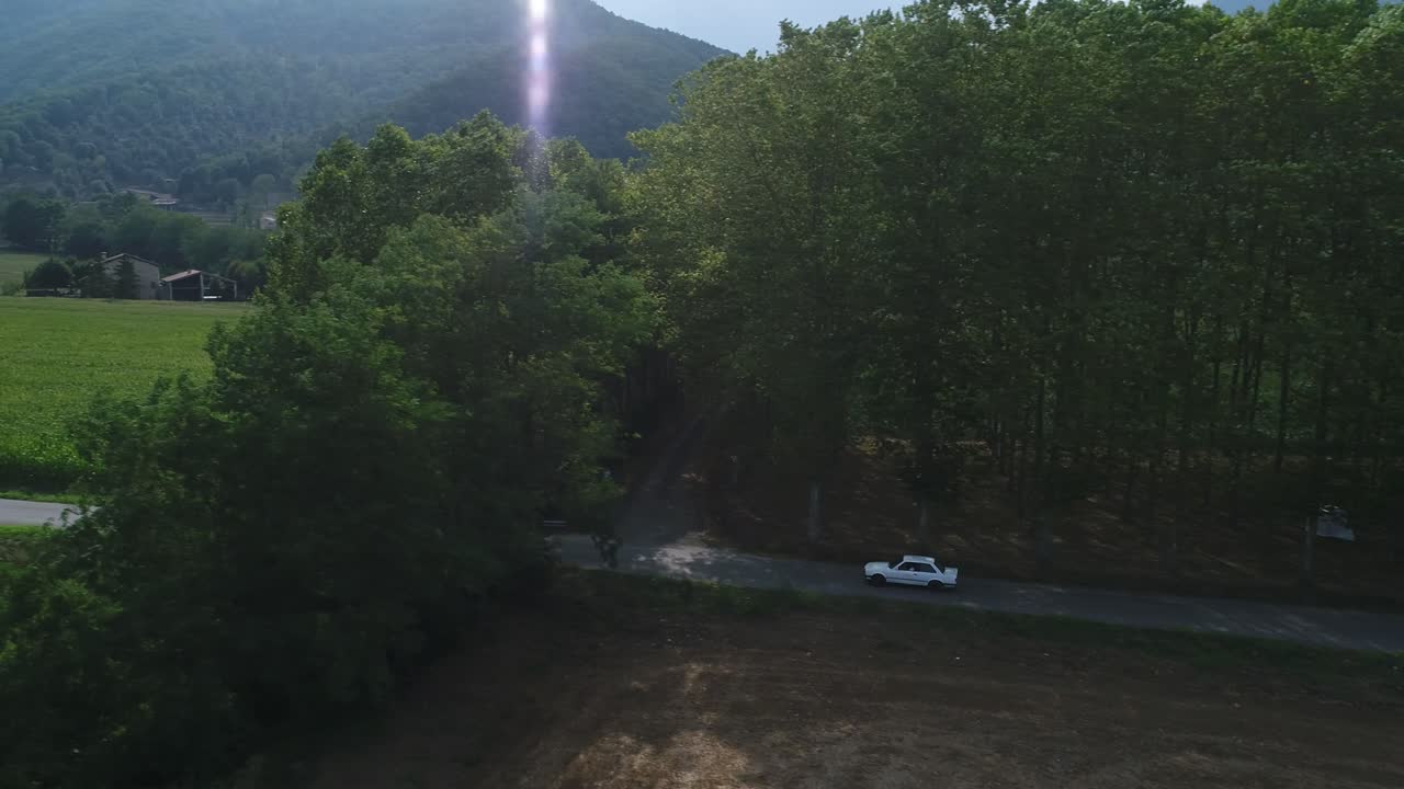 Aerial Scene, Getting Away From An Isolated White Car Driving A Rural ...