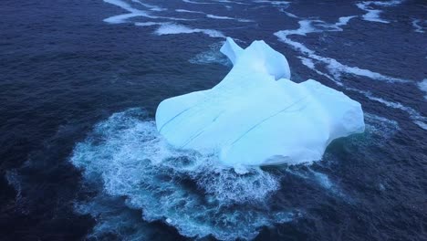 iceberg floating near the coast