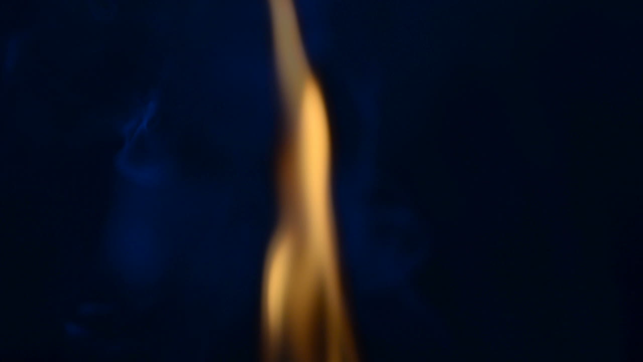 Slow Motion. Fire on a black background. Slow Motion