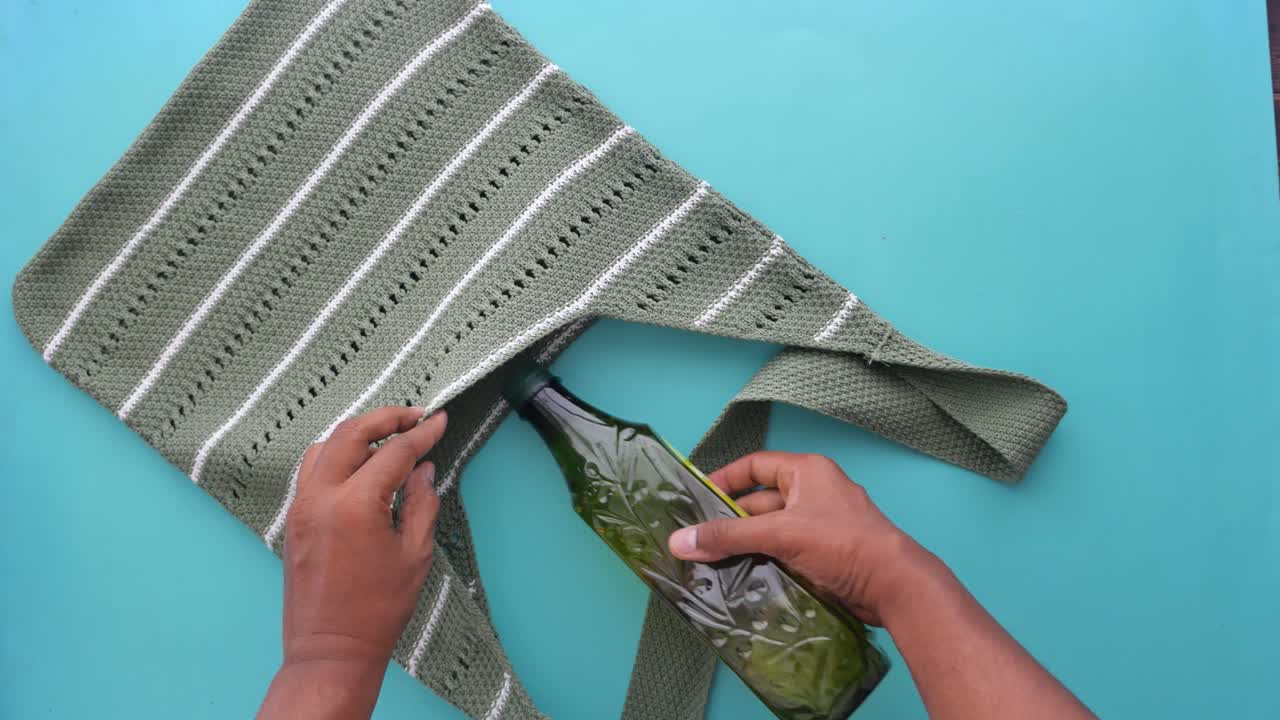 Bag filled with glass bottle