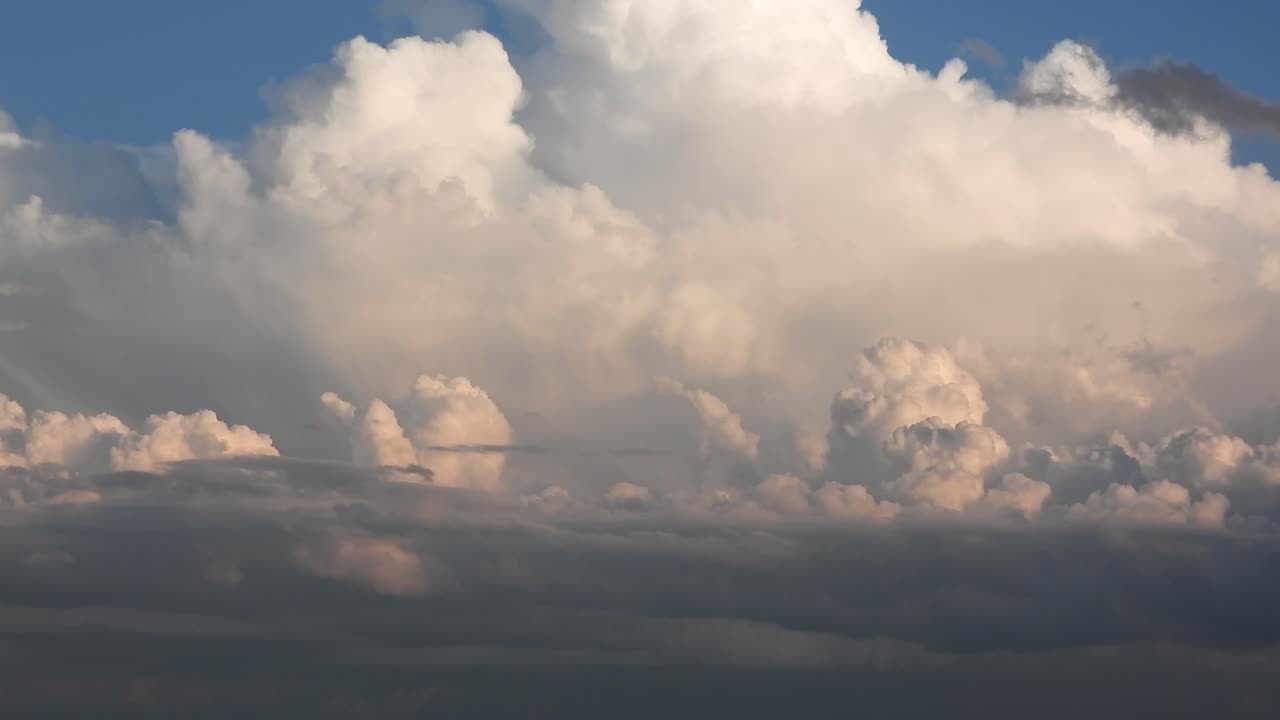 Clouds time-lapse skyline forming moving over blue sky Stratocumulus Cirrostratus