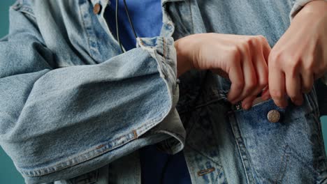 vintage cassette player in denim jacket