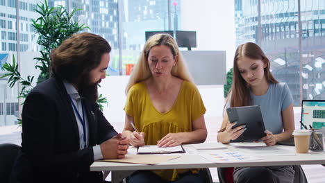 clients completing forms, taking loan from financial agent, doing handshake