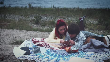 4k mom, son and dog having picnic