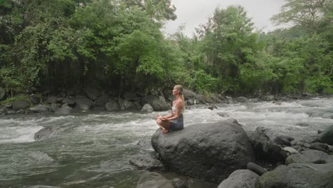 blond woman soul searching in lotus pose with healing nature sounds, yoga