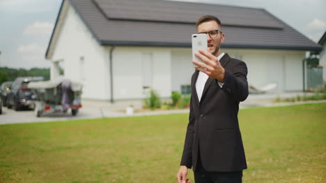 real estate agent talks to client via video and shows house