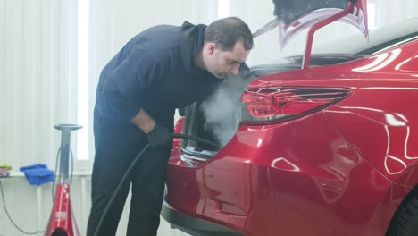 limpieza profesional de automóviles. lavado de sars. detalles interiores. limpieza en seco y detalles del interior de un automóvil. limpeza profunda de asientos. limpeza de espuma en el lavado de automóviles; limpieza del panel del automóvil del polvo. una aspiradora