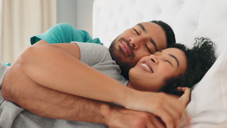 Couple,-talking-and-happy-cuddle-in-the-bed-to