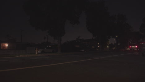 Cars-in-a-neighborhood-at-night