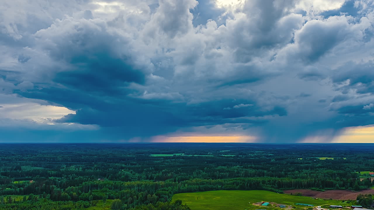 Dramatic sky above lush fields captured in dynamic hyperlapse motion