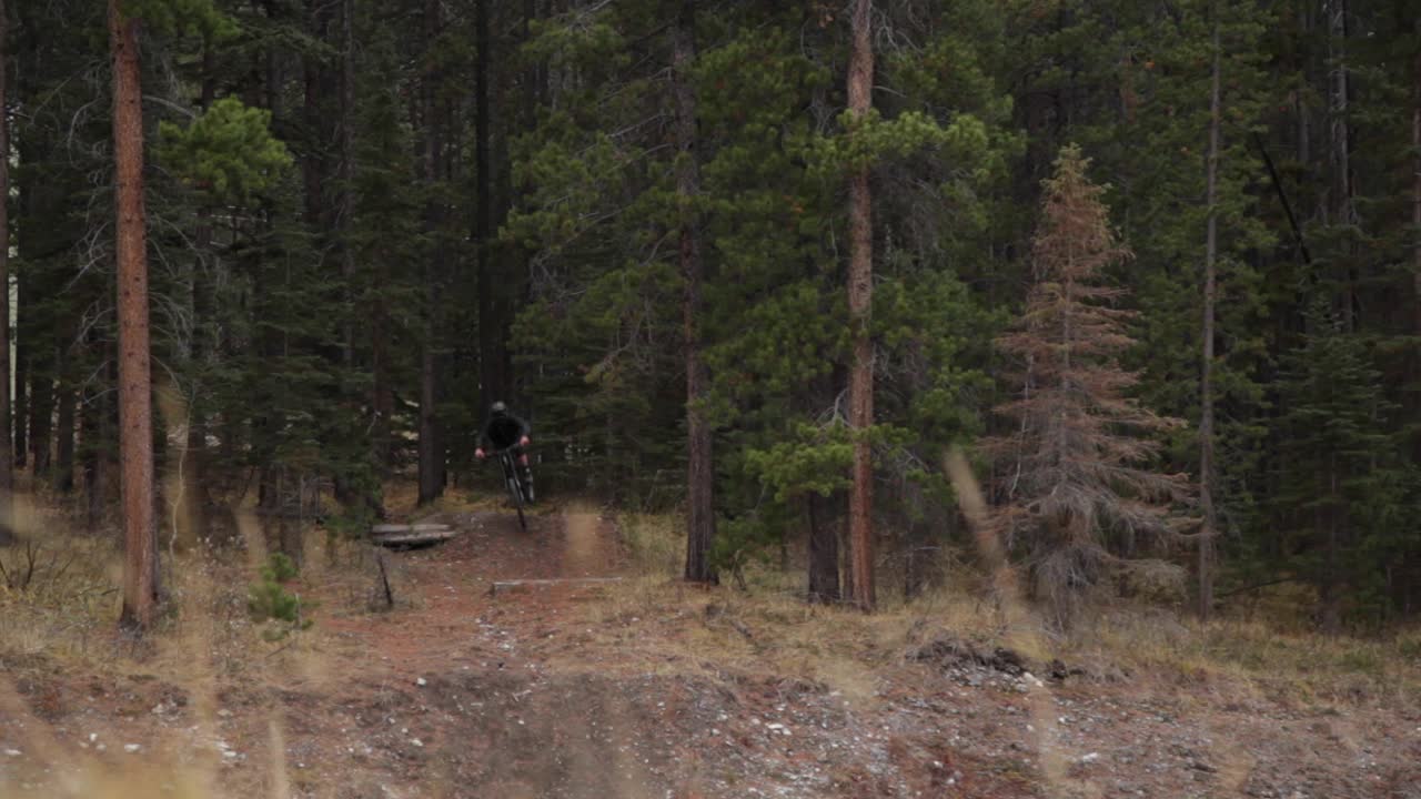 Biker jumps towards the camera