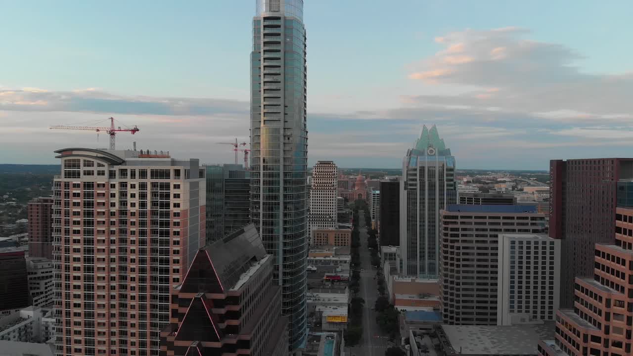 Austin TX during the Coronavirus pandemic. Iconic Austin buildings and empty streets with construction in the background.