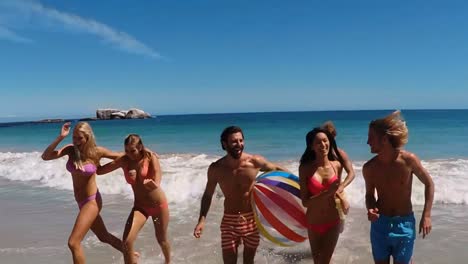 Group-of-friends-having-fun-on-beach