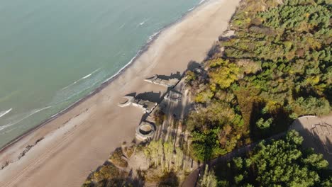 Aerial-view-the-remains-of-a-World-War-II-defensive-bunker-that-was-built-on-the-shore-of-the-Baltic-Sea-near-the-city-of-Klaipeda