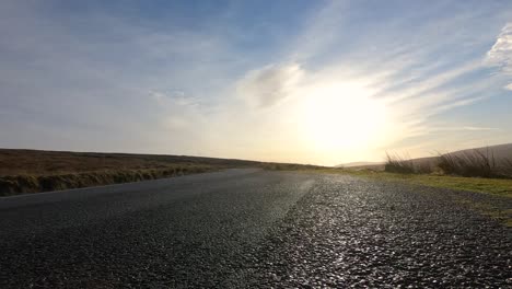 Harsh-summer-time-clouds-dawning-over-to-the-road-to-Wicklow-mountains