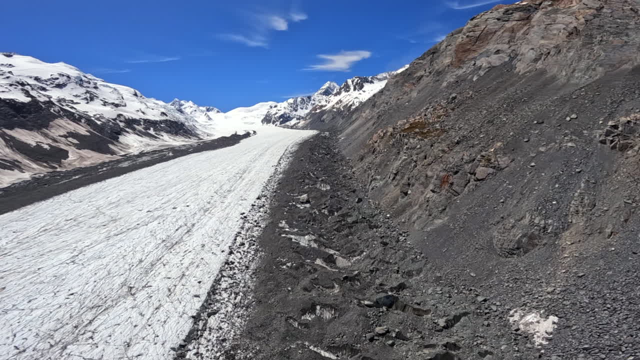 Flying over the barren and rugged landscape of the Tasman Glacier, New Zealand
