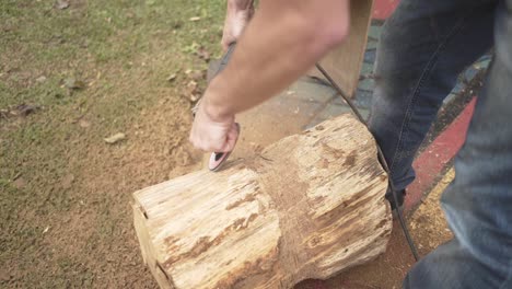 carpenter working sanding with woodworking machines in carpentry shop