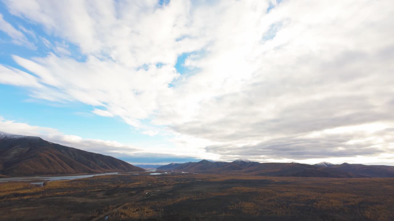 Experience the vast and beautiful terrains of Yakutia as a drone glides over mountains, rivers, and valleys, capturing the essence of this remote region’s unique natural beauty throughout the year.