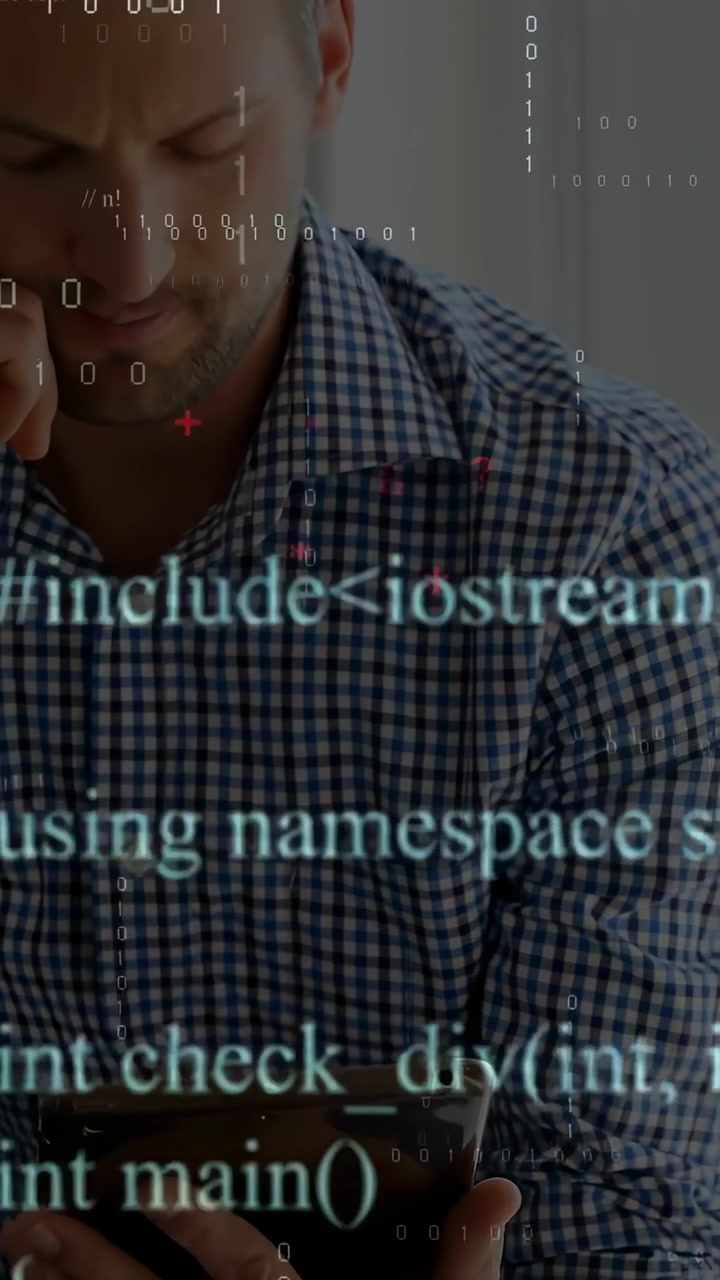 Vertical video: Man tapping, scrolling pad seeing tech code overlays growing on torso while reading