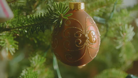 christmas ornaments hanging on a tree