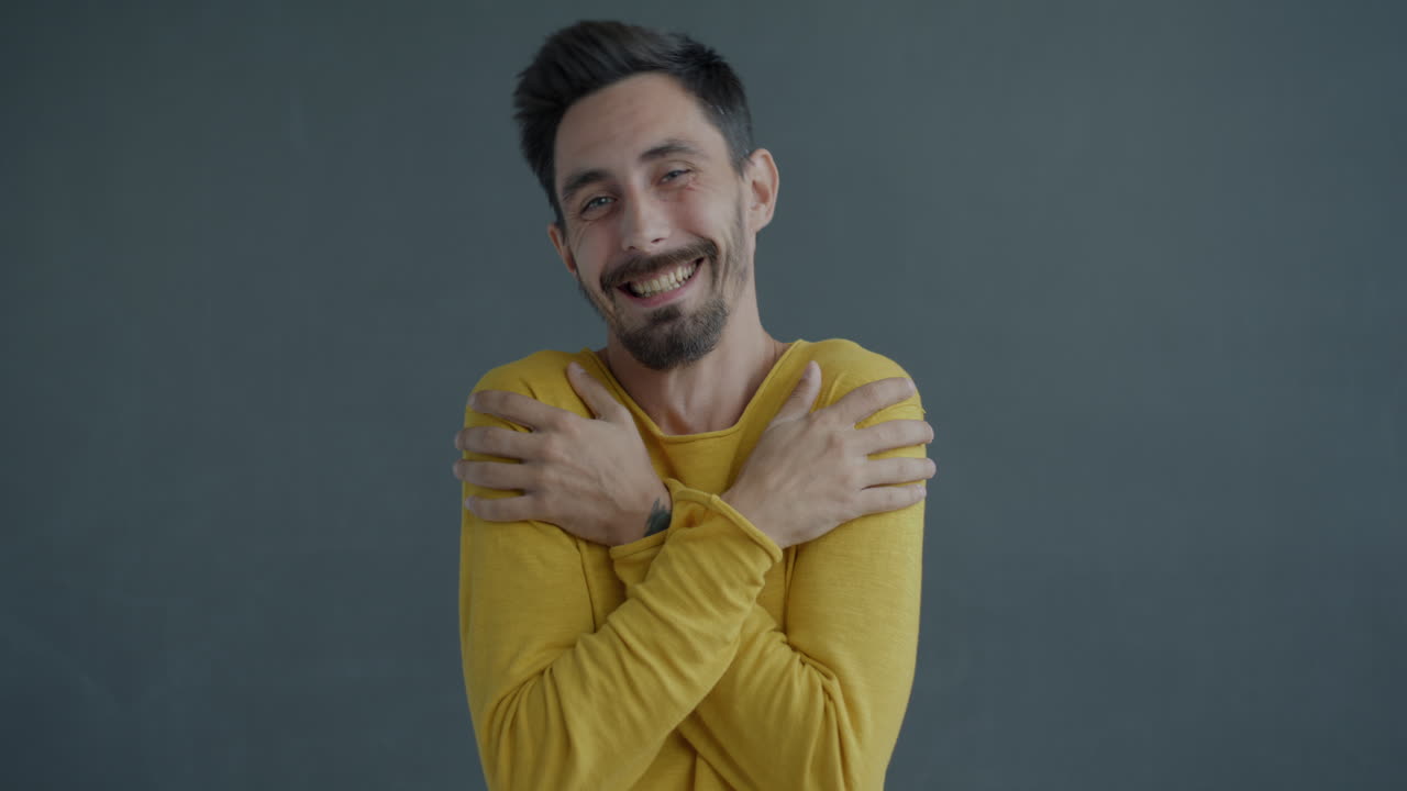 Happy Man in Yellow Shirt