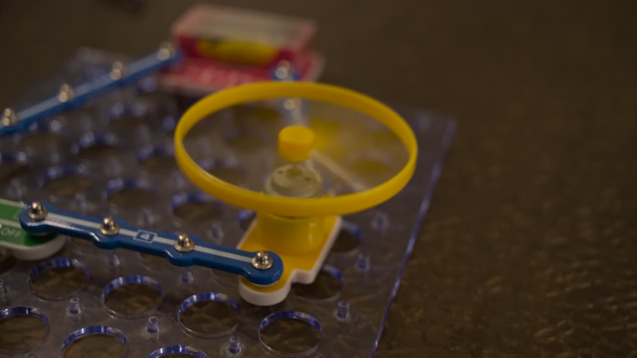 Yellow Fan Spinning on an Educational Electronics Kit