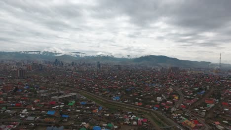 aerial drone shot from top view dozen of yurts poor area in mongolia ulan bator