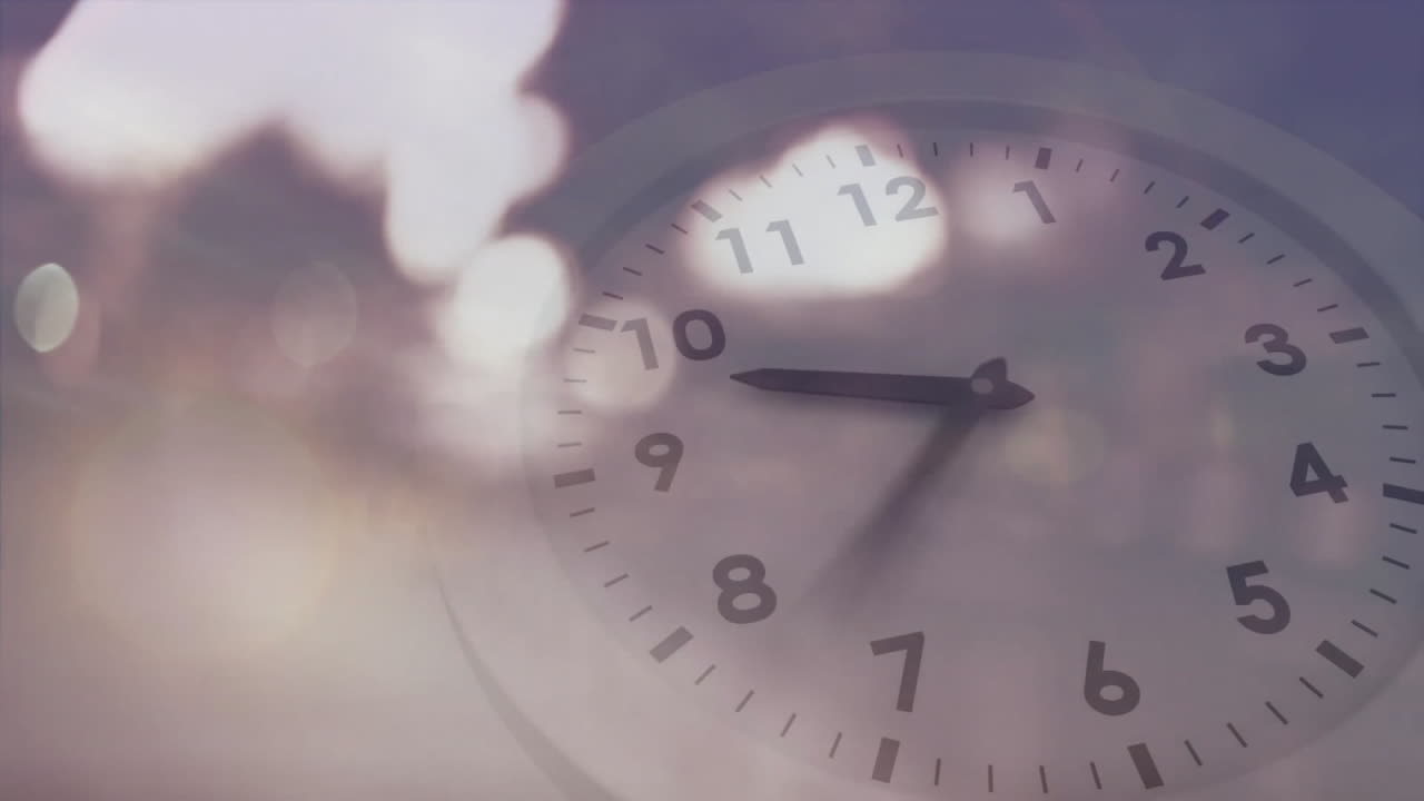 Animation of moving clock over cityscape and light spots