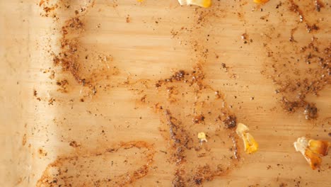 burnt corn on a wooden cooking surface
