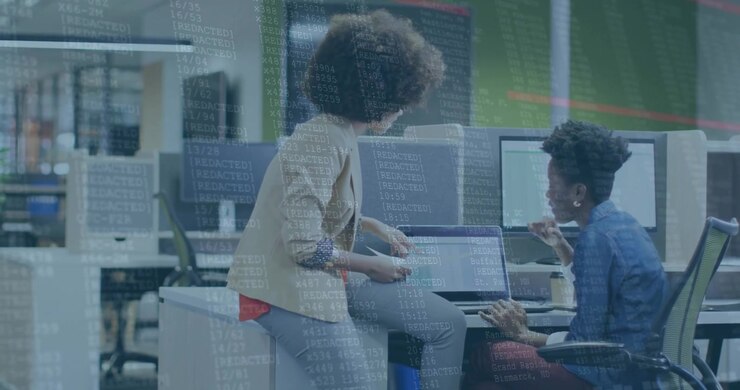 Diverse professionals collaborating at office with data processing animation overlay