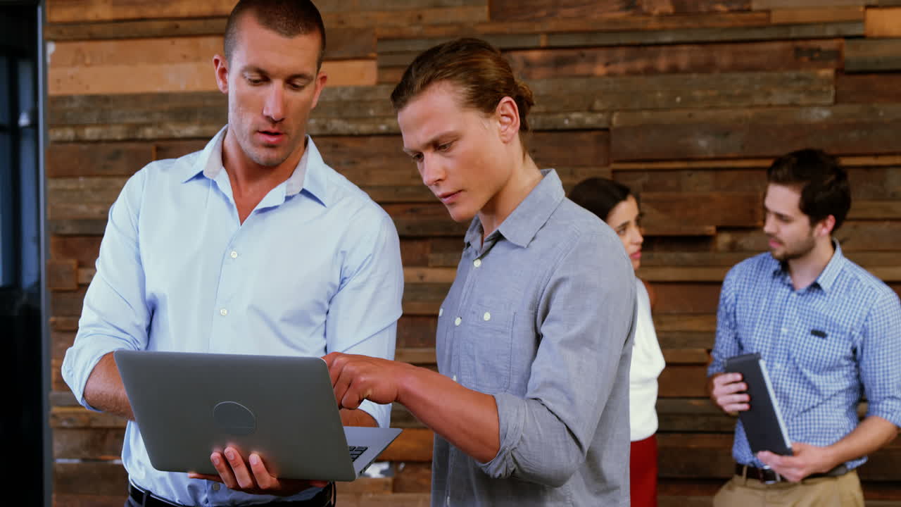 Business executives interacting with each other