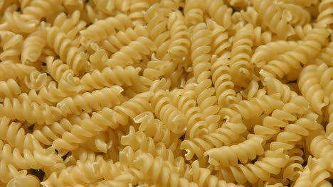 fusilli pasta laid out 4k