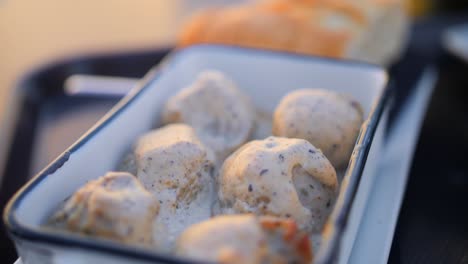 close up of delicious meatballs in creamy truffle sauce