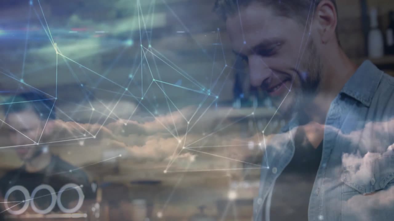 Man tapping tablet in cafe activating network overlay and syncing orders while barista making brew
