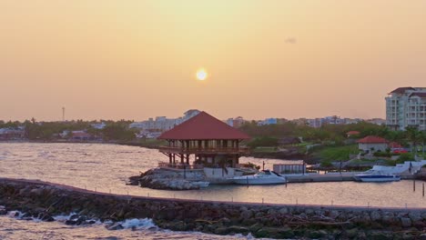 Sunset-Scenery-At-Hilton-Garden-Inn-La-Romana,-Dominican-Republic---aerial-shot